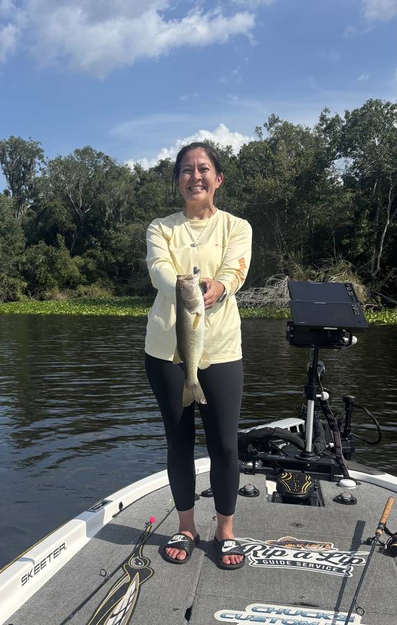 Happy client with a Rodman-area largemouth bass